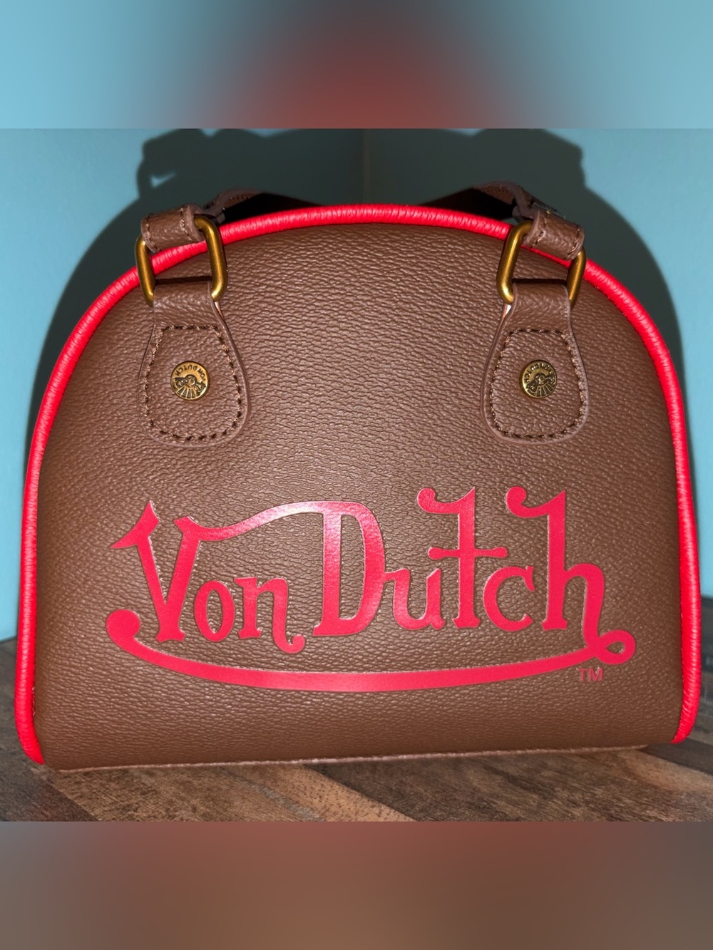 Von Dutch Brown Bowling Bag with Red Logo Trim and Shoulder Strap. NWOT